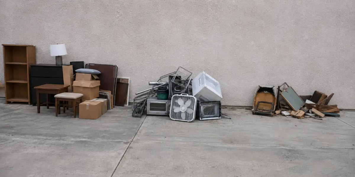 Junk sorted into donation, recycling and landfill piles in Brea